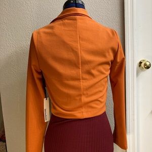 Cropped orange jacket